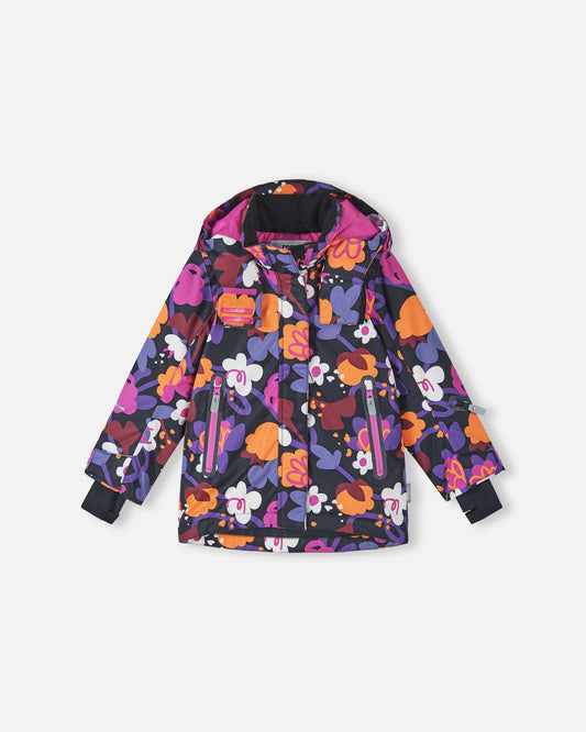 Front flat-lay view of the Reima Kiiruna girls' waterproof ski jacket in black with a vibrant pink, purple, and orange floral print, featuring a detachable hood, weather-resistant front zipper, and zippered hand pockets.