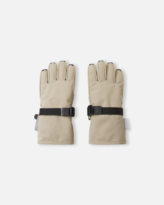Flat lay view of the backs of the earthy beige Reima Tartu kids' winter gloves, featuring an adjustable wrist strap for a snug, flexible fit and a classic design perfect for everyday winter wear.