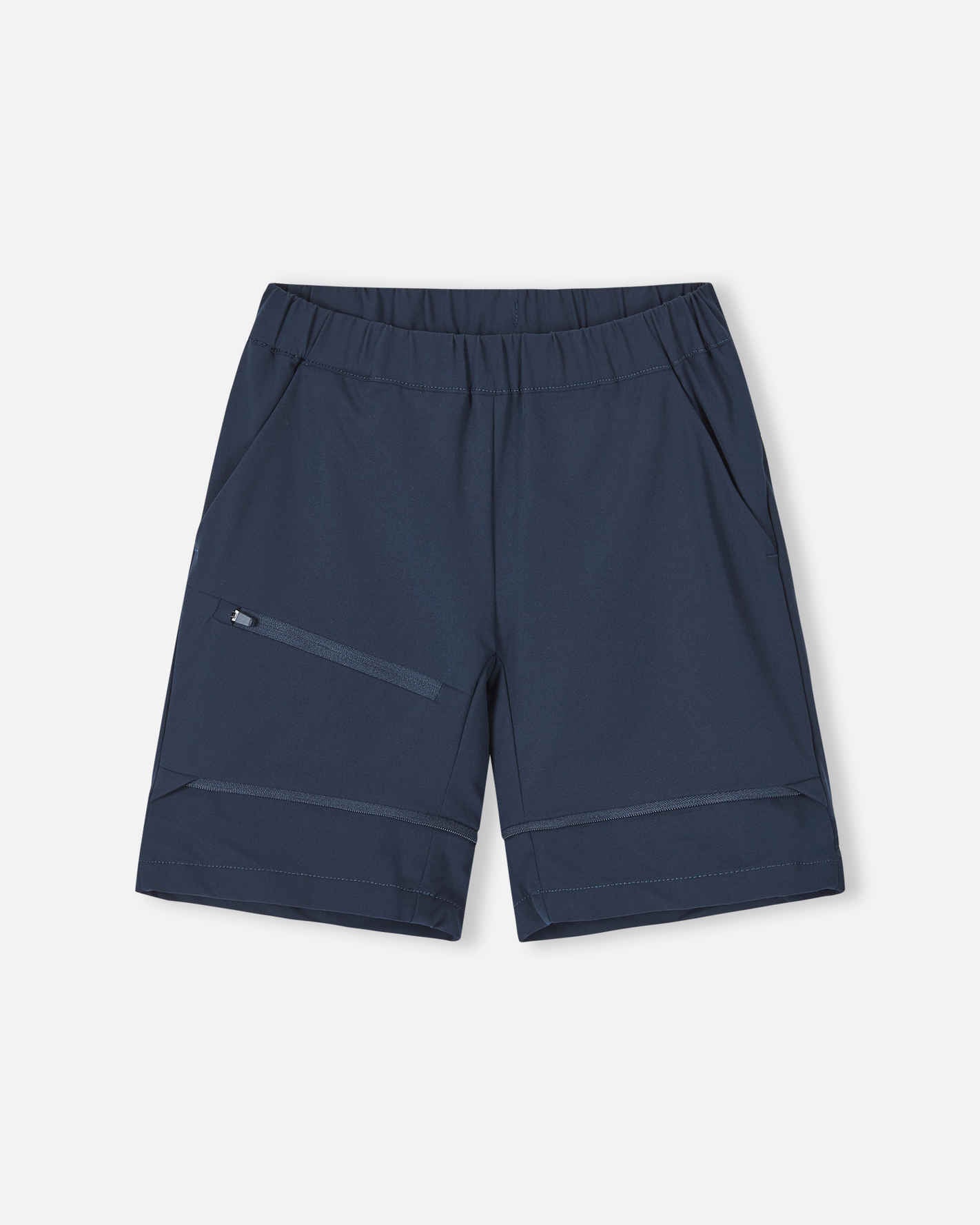 Front view of the Reima Tuplat kids' hiking pants converted into navy blue shorts, showing the comfortable athletic cut, deep side pockets, and secure zippered cargo pocket ideal for summer trail exploration.