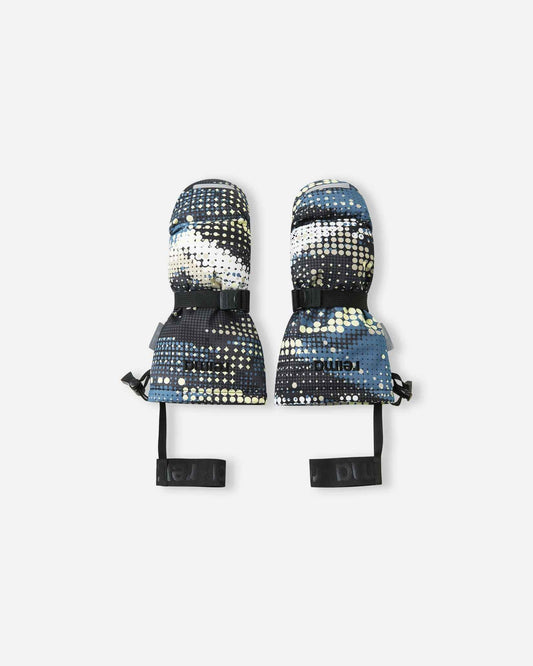 Flat lay view of the backs of the soft black dot-patterned Reima Vanukko kids' ski mittens. The image highlights the extra-long gauntlet cuffs, adjustable wrist straps, and elastic safety wrist leashes designed for winter sports.