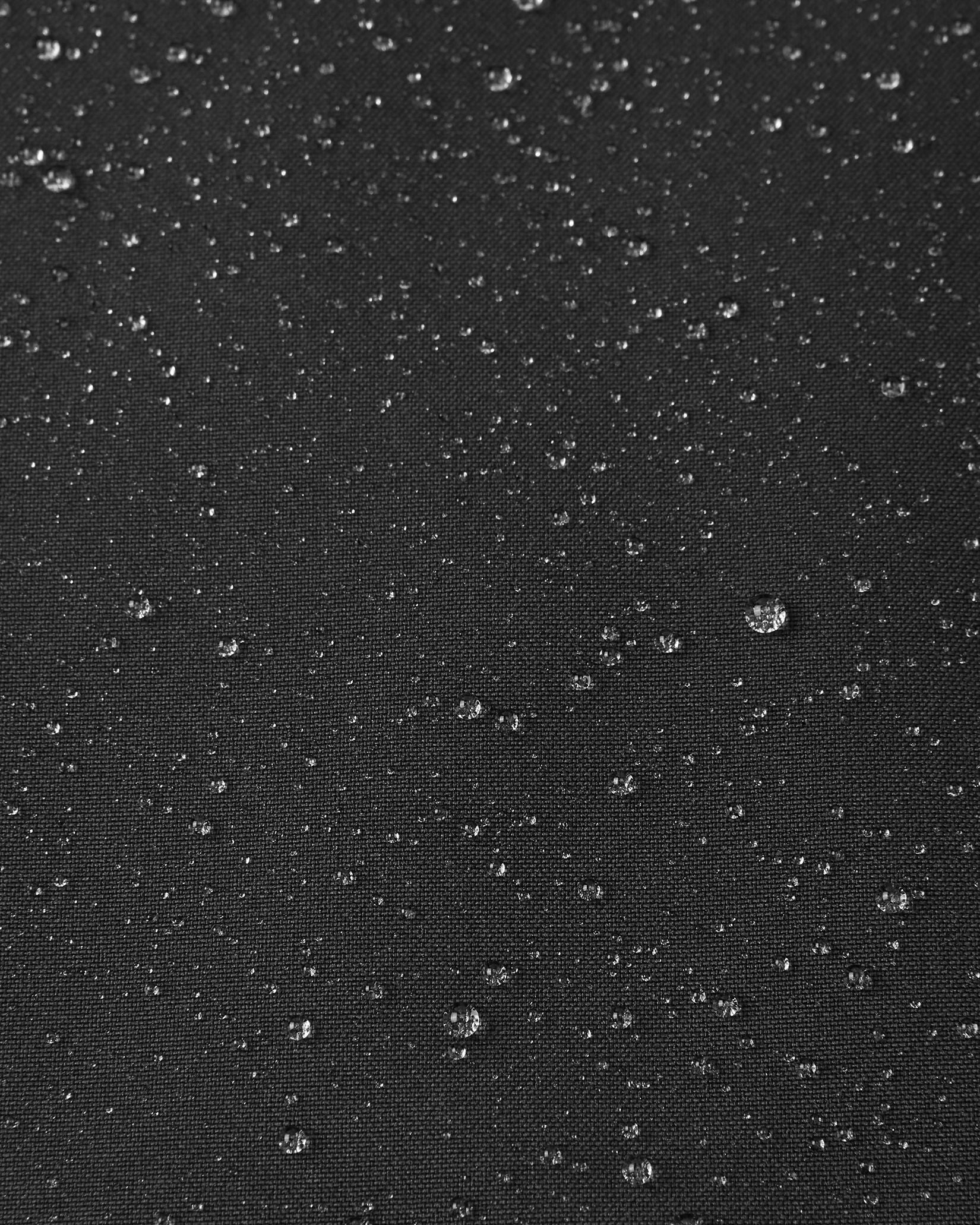 Detail of the durable, breathable, and water-repellent fabric on the Sulkava kids' shell.