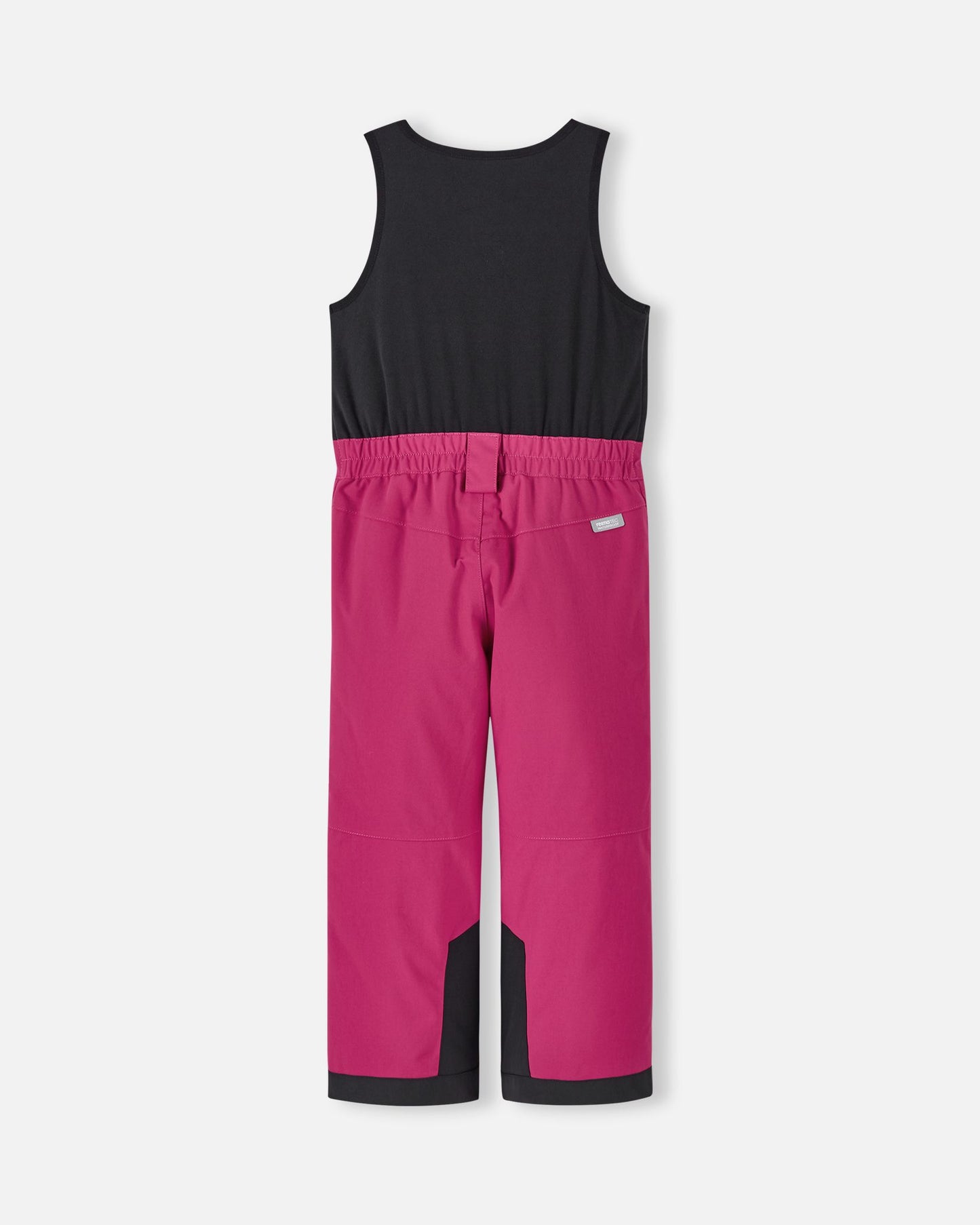 Back flat lay view of the rosy berry Reima Alppi kids' ski bibs, showcasing the stretchy black fleece upper back for comfort, an elasticized waist, and bright pink waterproof lower pants.