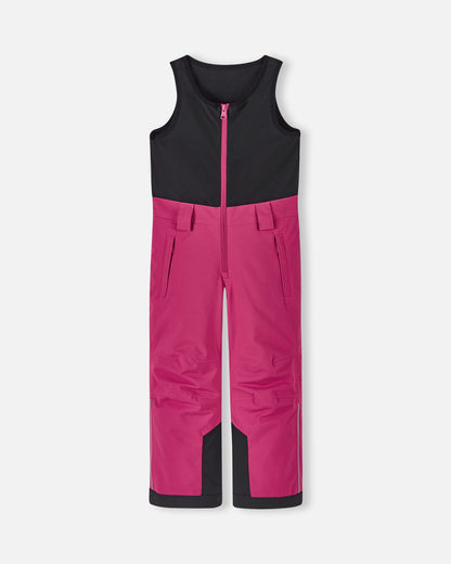 Front flat lay view of the rosy berry pink Reima Alppi kids' snow bib pants, featuring a warm black fleece upper torso vest, a smooth front zipper, and durable waterproof legs designed for active winter sports.