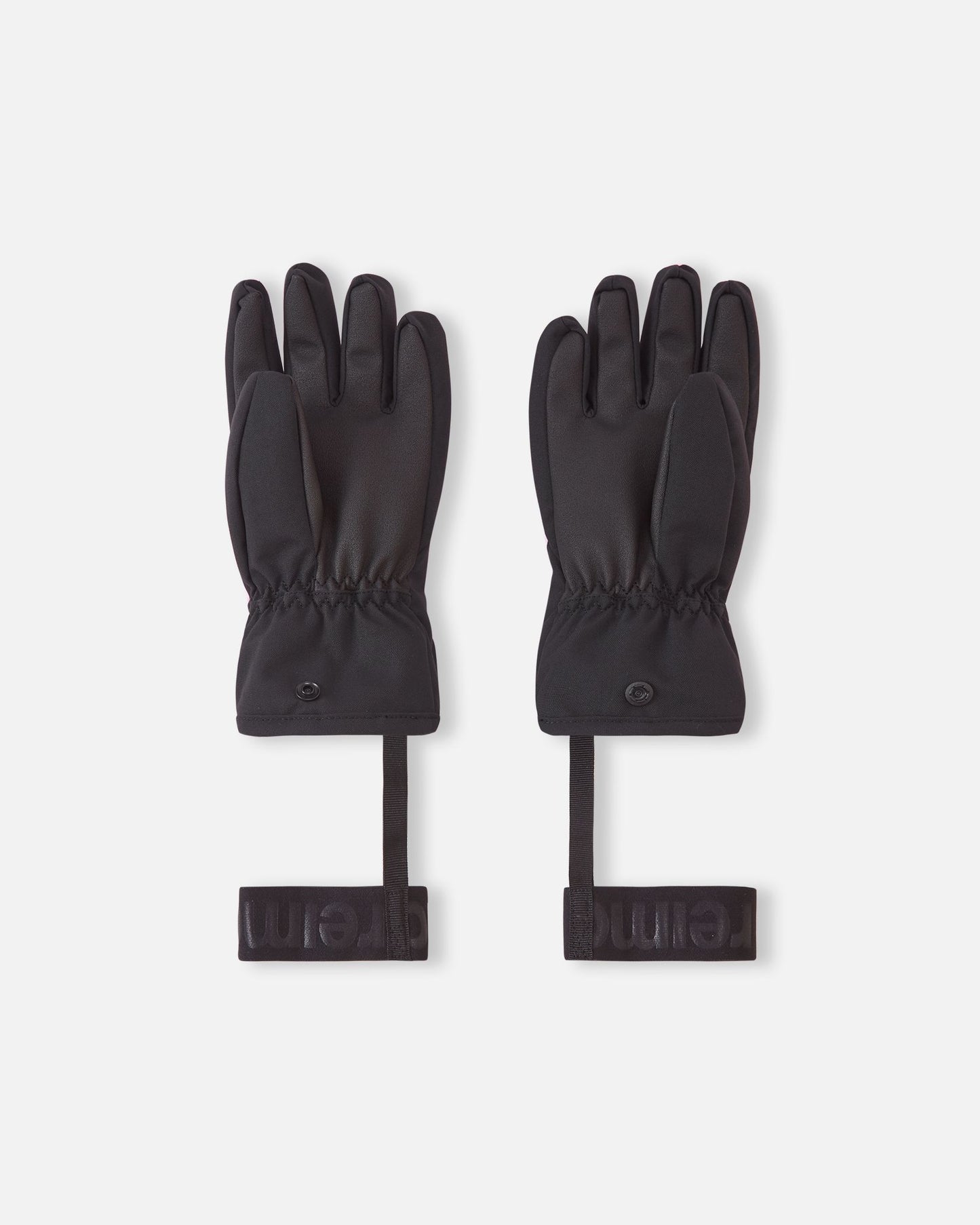 Palm side of the light heather Reima Hankas kids ski gloves, highlighting the durable black grip material, elastic gathered wrist, and secure snap button closure for winter sports.