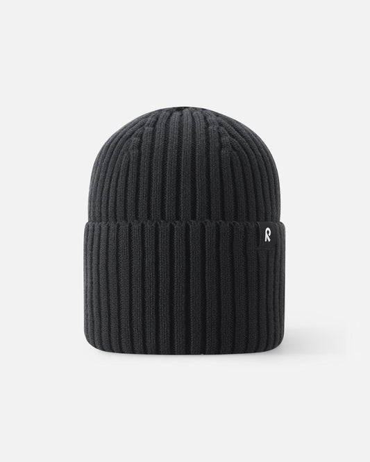 Back view of the Reima Hattara kids' organic cotton ribbed beanie in classic black, showcasing the thick, warm knit texture and cozy cuffed design.