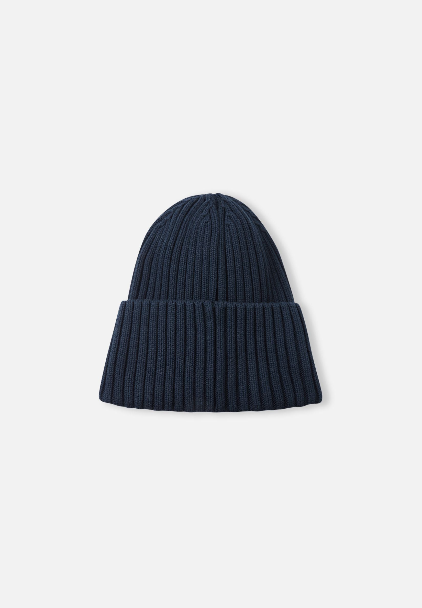 Back view of the navy blue Reima Hattara kids' organic cotton beanie, showcasing the seamless vertical knit design and comfortable warmth.