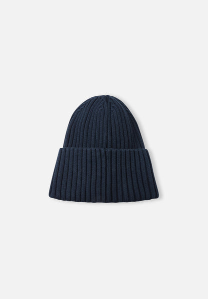 Back view of the navy blue Reima Hattara kids' organic cotton beanie, showcasing the seamless vertical knit design and comfortable warmth.