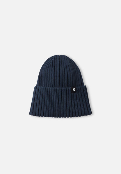 Flat lay view of the navy blue Reima Hattara kids' organic cotton ribbed beanie, highlighting its classic winter hat shape and durable construction.