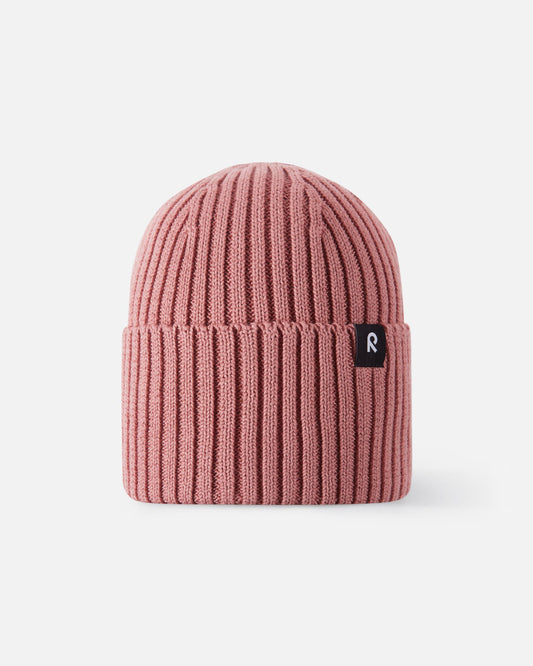 Front view of the Reima Hattara kids' organic cotton ribbed beanie in rose blush, featuring a comfortable cuffed brim and a black Reima logo label.
