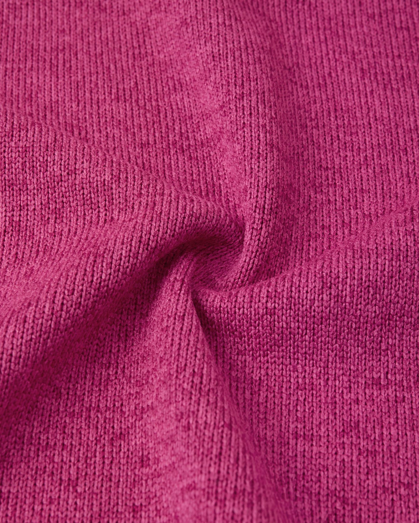 Macro close-up of the Reima Hopper kids' rosy berry knit fleece fabric, demonstrating the high-quality, sweater-like texture and thermal mid-layer performance.