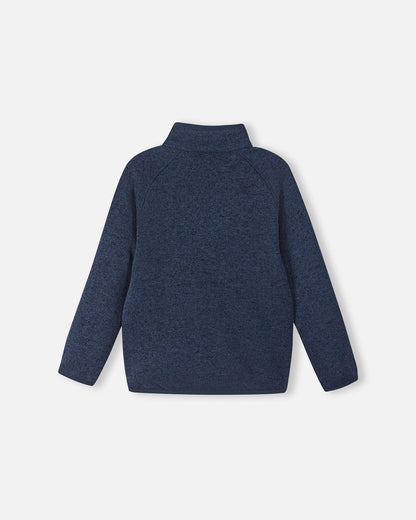 Back view of the Reima Hopper kids' jeans blue knit fleece jacket, showcasing the raglan sleeves and smooth, durable mid-layer construction.