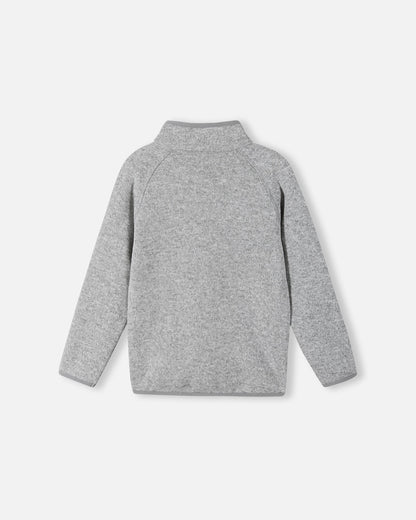 Back view of the Reima Hopper kids' melange grey knit fleece jacket, showcasing the raglan sleeves and smooth, durable mid-layer construction.