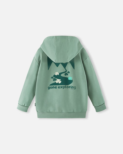 Back view of the stone green Reima Huppis kids' organic cotton hoodie, featuring a large, tonal green mountain and trail graphic print with the motivational text "gone exploring."