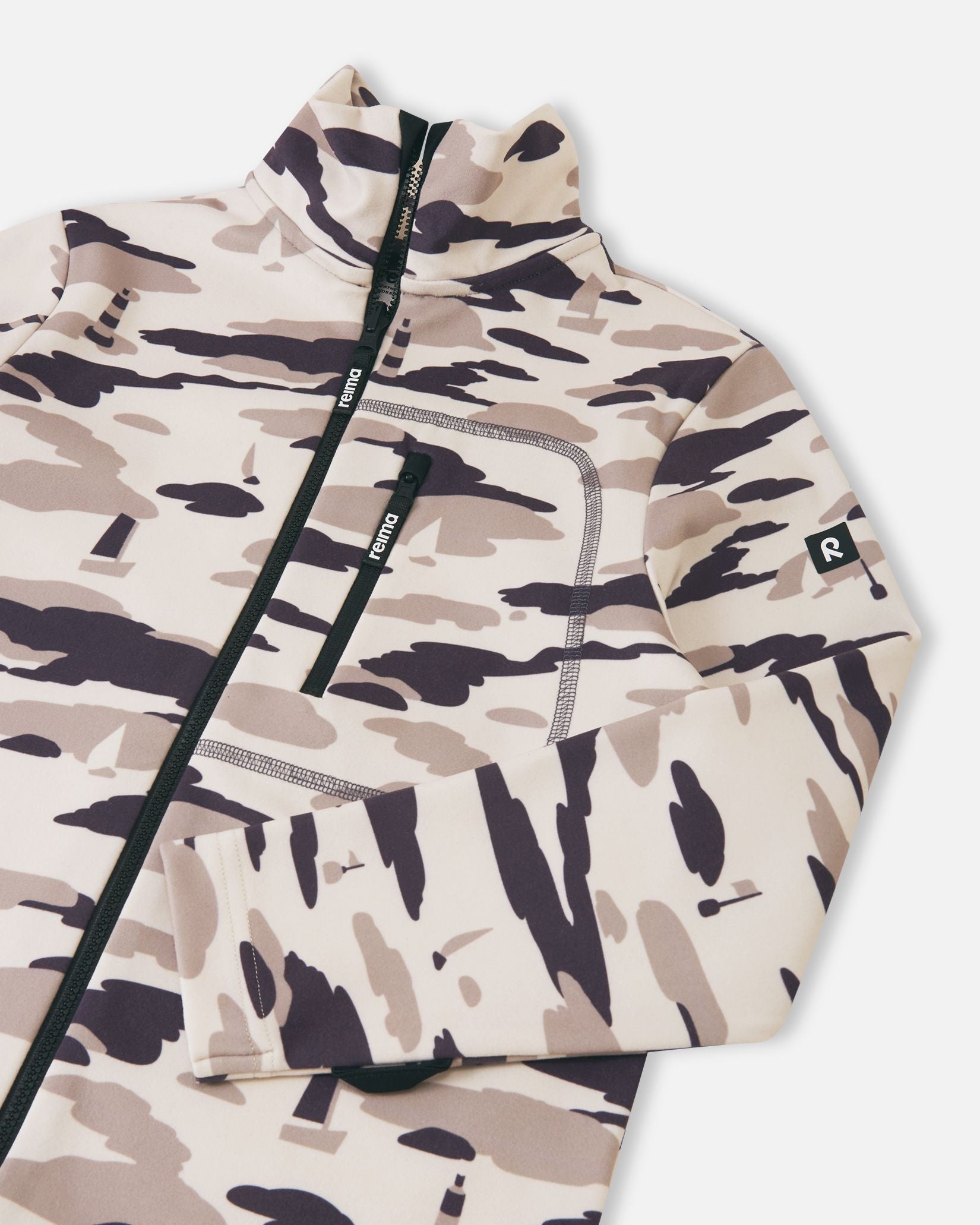 Detailed close-up of the upper section of the earthy beige Reima Iisisti kids' fleece, focusing on the contrast stitching around the zippered chest pocket, the high collar, and the sturdy front zipper.