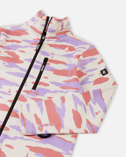 Close-up of the upper front on the rose blush Reima Iisisti kids' fleece jacket, highlighting the smooth front zipper, the functional zippered chest pocket, the Reima sleeve logo, and the protective high collar.