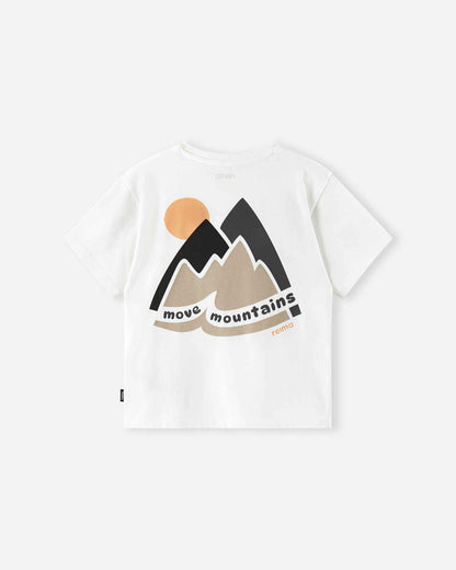 Back view of the off-white Reima Ikioma kids' UPF 50+ active t-shirt, featuring a bold mountain and setting sun graphic print with the "move mountains" text across the shoulders.
