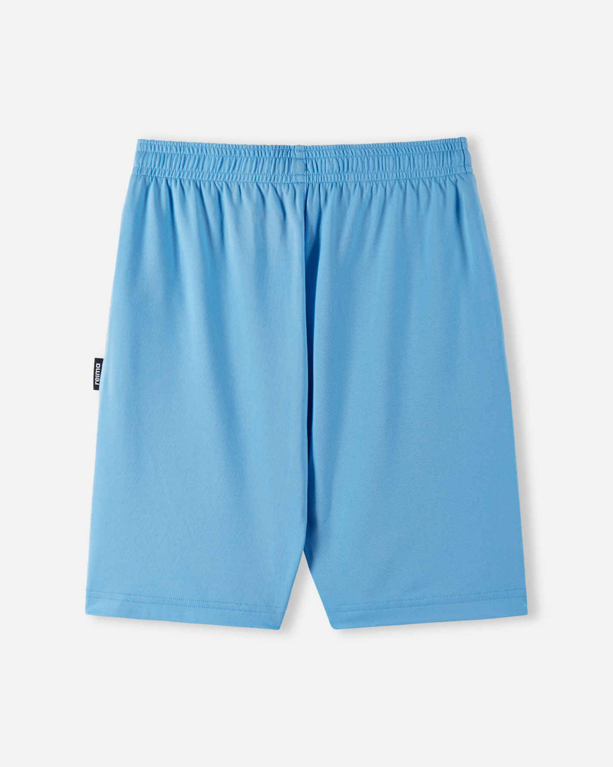 Back view of light blue Reima Ilmassa shorts featuring a gathered elastic waistband and a small black logo tag on the side.