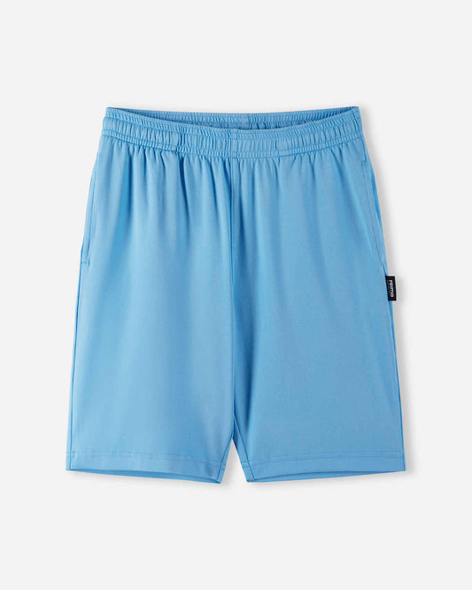 Front view of the Reima Ilmassa kids sunproof shorts in fresh blue, featuring an elastic waistband and a small logo tag on the side.