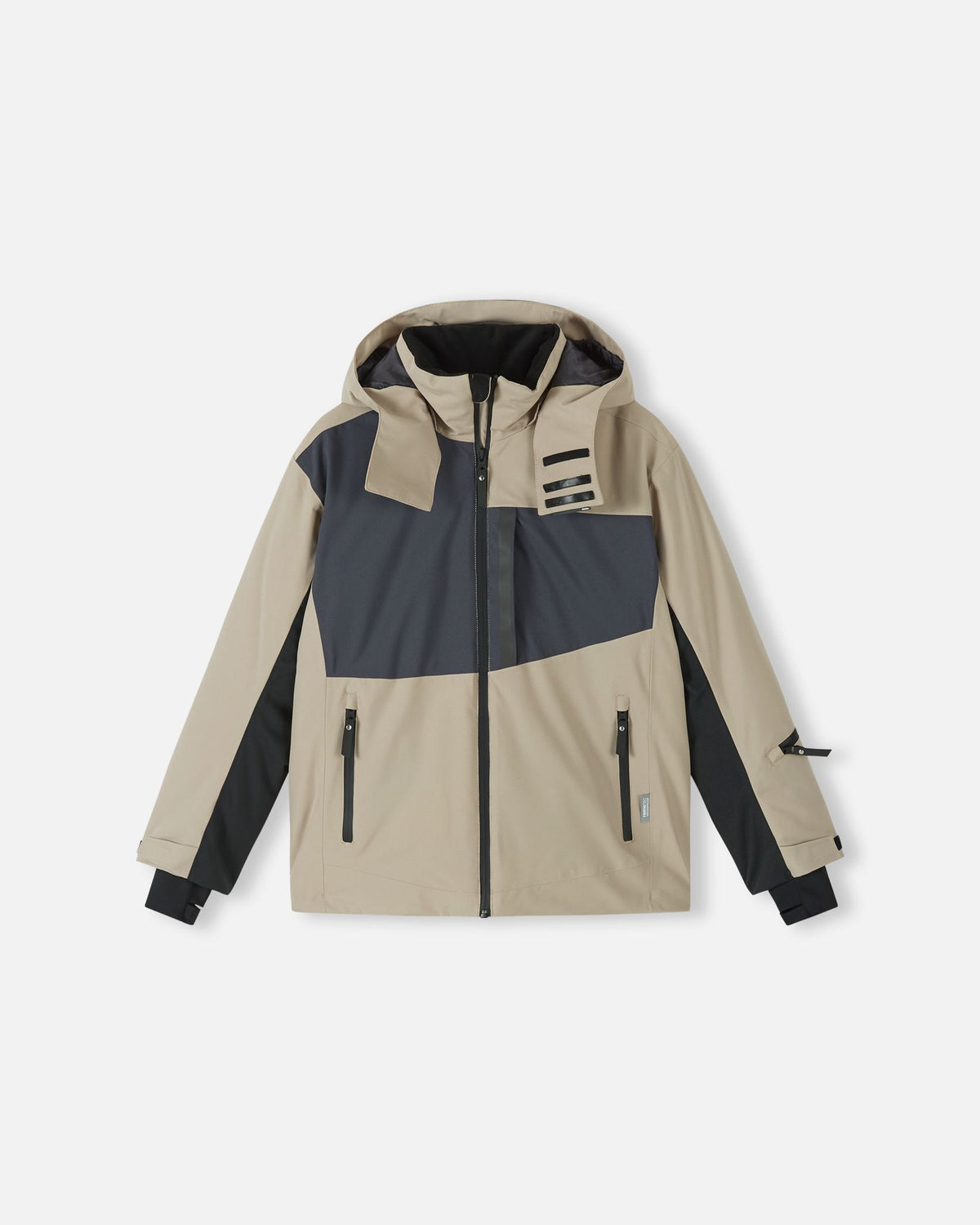 Front flat lay view of the earthy beige Reima Jatuni kids' ski jacket, featuring dark grey color blocking, a detachable hood, and multiple zippered waterproof pockets designed for active winter sports.