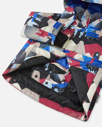 Interior view of the Reima Kairala kids' ski jacket, revealing the smooth black lining and the built-in snap-button snow lock powder skirt designed to keep snow out during winter sports.