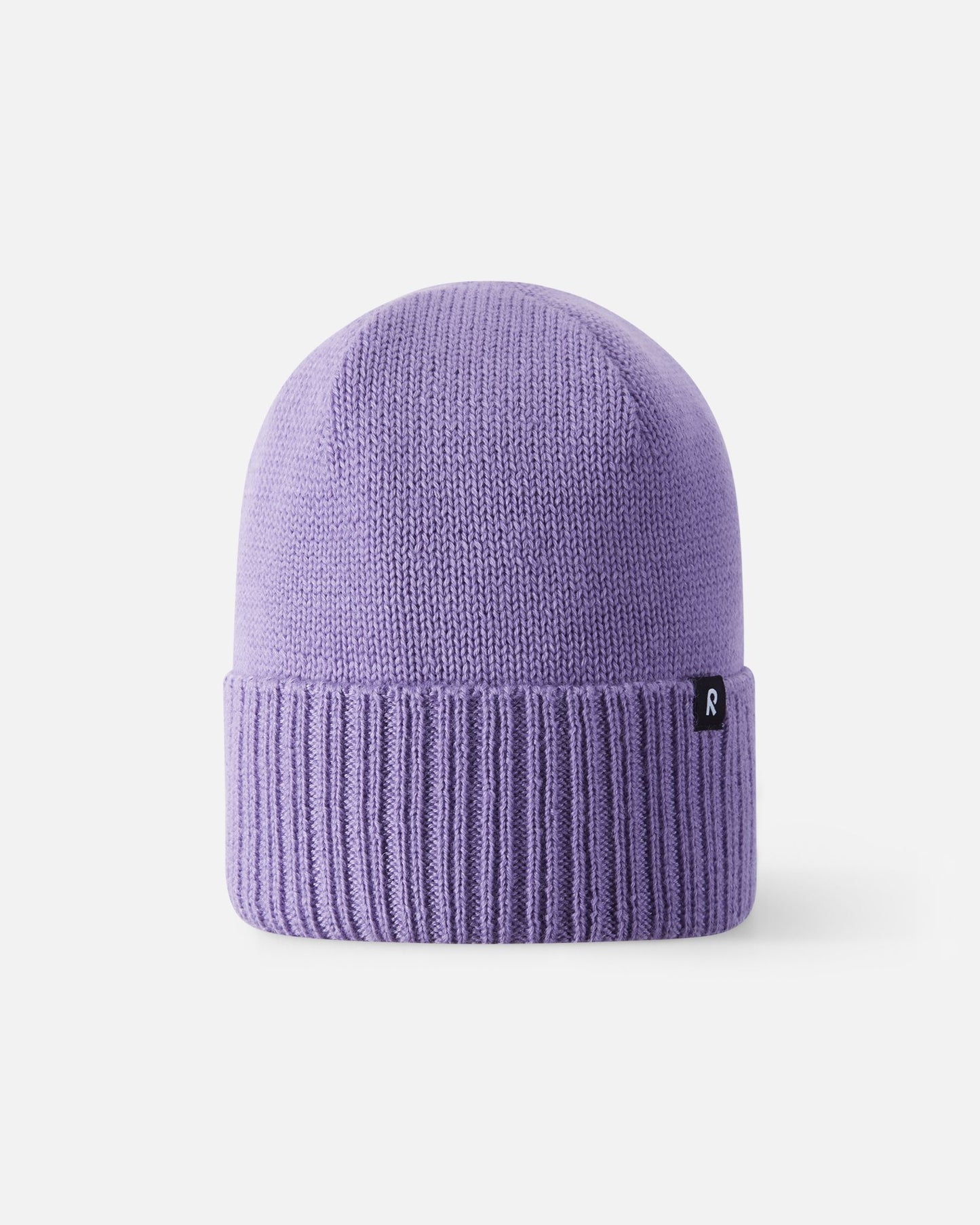 Front view of the Reima Kalotti girls' winter hat in blooming lilac, showcasing the premium merino wool knit and classic ribbed fold-over brim.