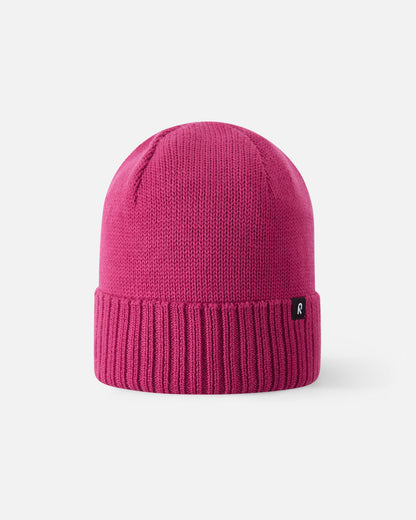 Front view of the Reima Kalotti kids' merino wool beanie hat in a vibrant rosy berry pink, featuring a classic ribbed fold-over brim.