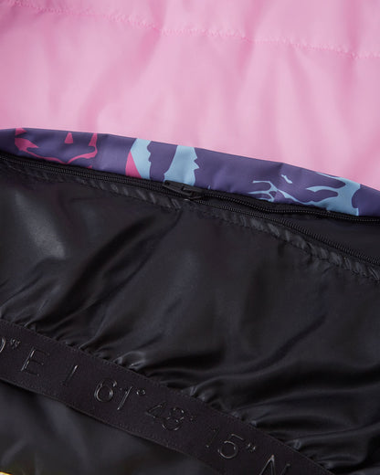 Close-up interior detail of the Reima Kiiruna girls' ski jacket in grey pink, showing the internal black zipper mechanism used to attach or remove the snow lock powder skirt.