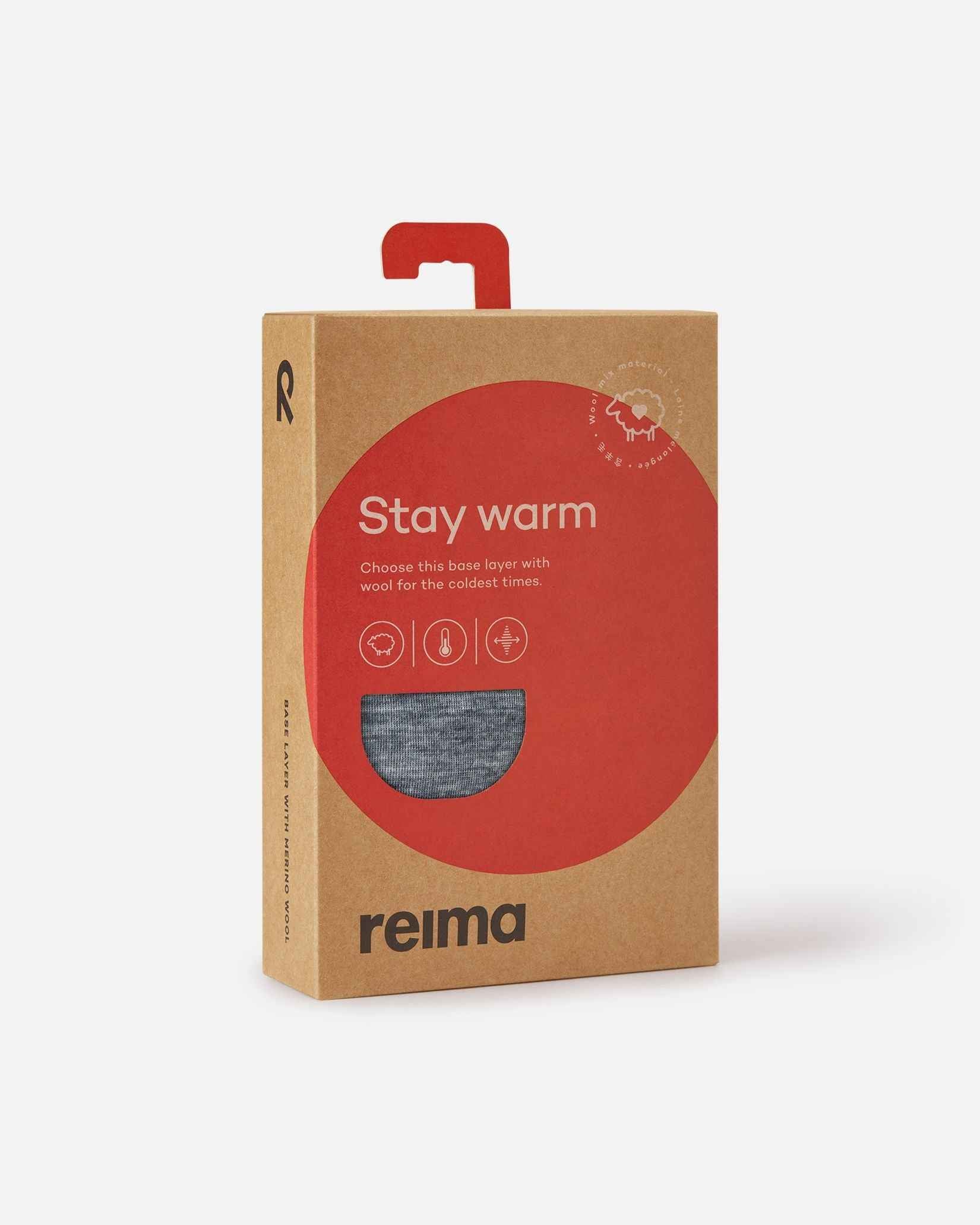 Retail packaging for the Reima Kinsei kids' merino wool base layer set, featuring a red label that reads "Stay warm" and a cutout window displaying the melange grey fabric inside.