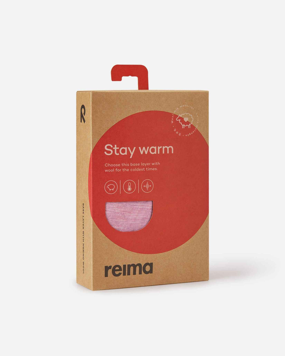 Front view of the retail cardboard packaging for the Reima Kinsei kids' merino wool base layer set, featuring a red "Stay warm" label and a circular cutout displaying the grey pink fabric.