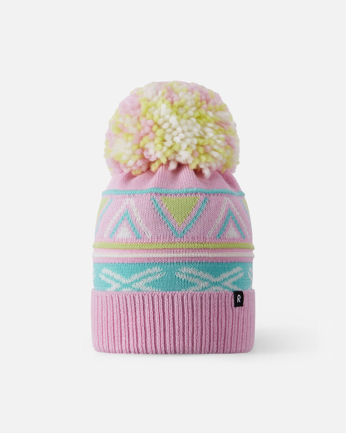 Front studio view of the Reima Kirjoen kids' merino wool winter hat in light heather pink, featuring a pastel multicolored pom-pom, geometric jacquard knit pattern, and folded ribbed cuff.