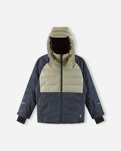 Front view of the fully zipped Reima Kuosku kids ski jacket in Soft black, showing the contrasting light upper panel, dark quilted body, and insulated hood.