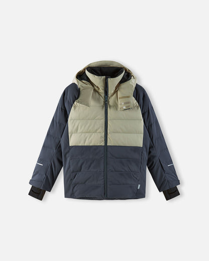 The primary product photograph of the fully insulated Reima Kuosku kids ski jacket in Soft black, showcasing a complete front view. The jacket features a clean color-blocked design with a light taupe upper panel, a dark charcoal quilted body, an insulated hood, a high protective collar with a distinct textured strap, a full-length zipper, horizontal quilting, and adjustable cuffs with inner lycra sleeves. This definitive image represents the complete insulated design for high-performance winter protection.