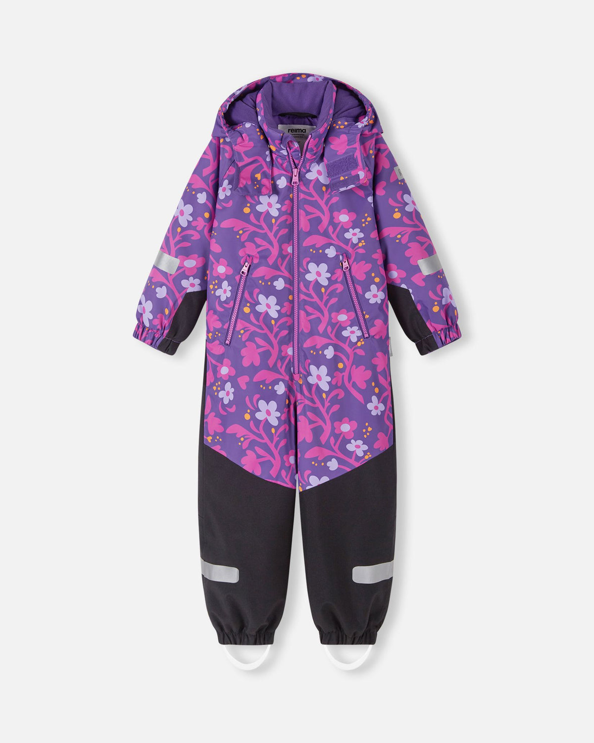 Front view of the Reima Kurikka waterproof kids' snowsuit in plum purple, featuring a bright floral pattern on the top half and durable, solid black reinforced fabric from the waist down to protect against winter wear.