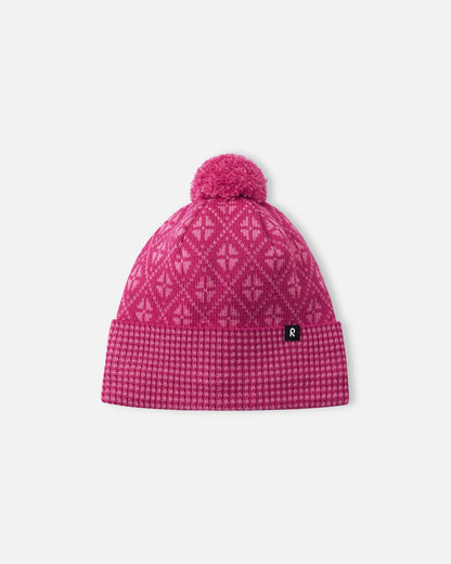 Front view of the Reima Kuurassa kids' merino wool beanie hat in a vibrant rosy berry pink, featuring a Nordic-inspired geometric pattern, a ribbed fold-over brim, and a matching pom-pom.