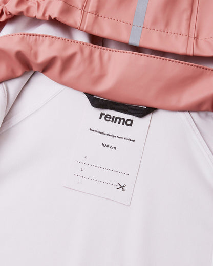 Close-up view of the interior collar on the Reima Lampi rose blush raincoat, displaying a durable black hanging loop and a built-in customizable name tag with writing lines to easily identify the jacket at school or daycare.