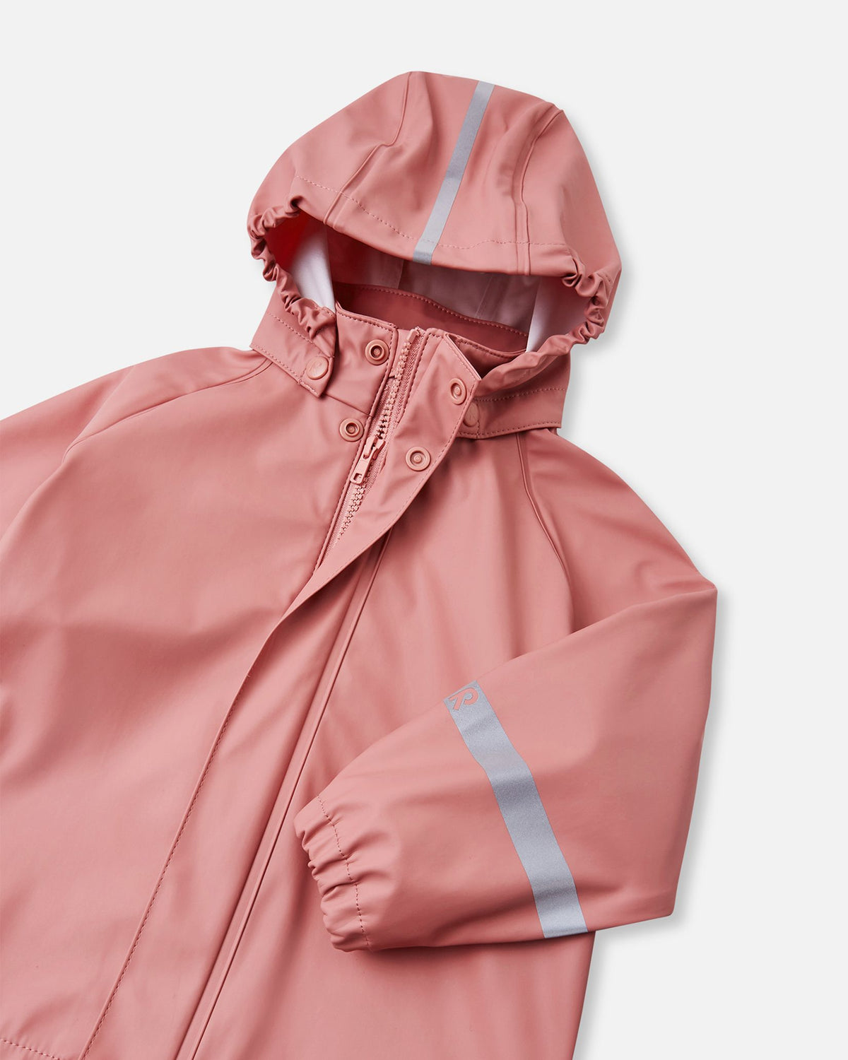 Angled close-up of the upper section of the Reima Lampi rose blush raincoat, showing the smooth front zipper, an elasticized hood designed for wind protection, and a prominent high-visibility reflective stripe centered perfectly on top of the hood.