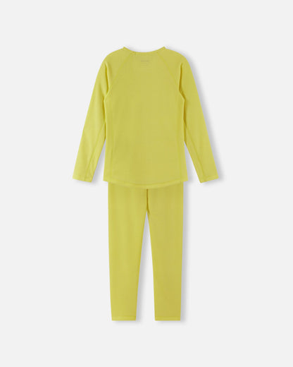 Back view of the yellow Reima Lani kids' thermal base layer set, showcasing the smooth, chafing-free flatlock seams and active fit for winter layering.