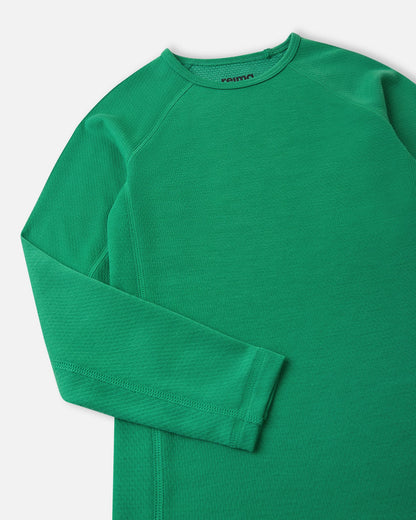 Close-up detail of the crew neck collar and raglan sleeve stitching on the green Reima Lani kids' moisture-wicking thermal shirt.