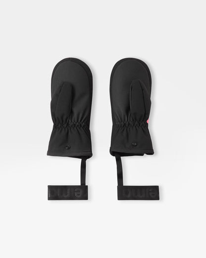 Flat lay view of the palms of the soft coral Reima Lapases kids' ski mittens, showcasing the durable black reinforced gripping surface on the thumbs and palms designed for securely holding ski poles.
