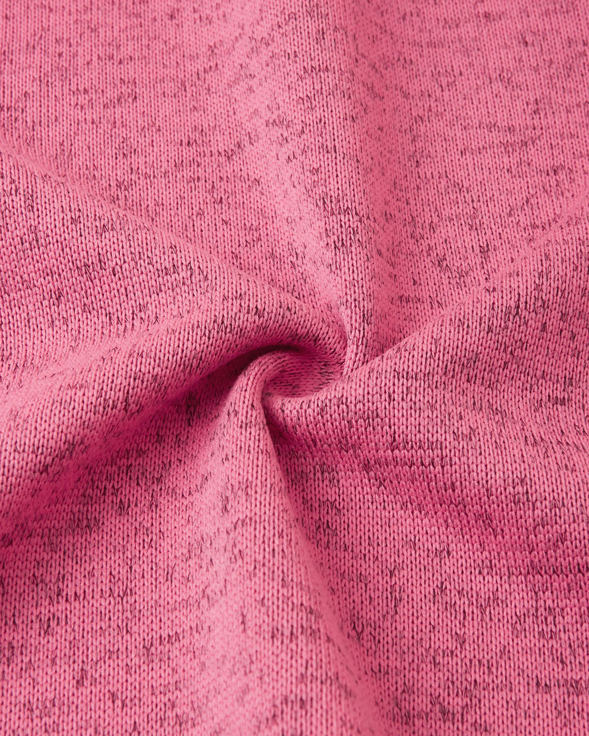 Macro close-up of the breathable, soft-brushed fleece knit fabric on the Reima Laskien kids' jacket, demonstrating its premium warmth and moisture-wicking properties.