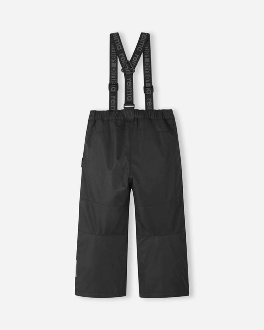 Back flat lay view of the black Reima Liikun kids' winter snow pants, showcasing the clean lines, elastic waistband, and durable reinforced lower legs built to withstand heavy wear and tear on the mountain.