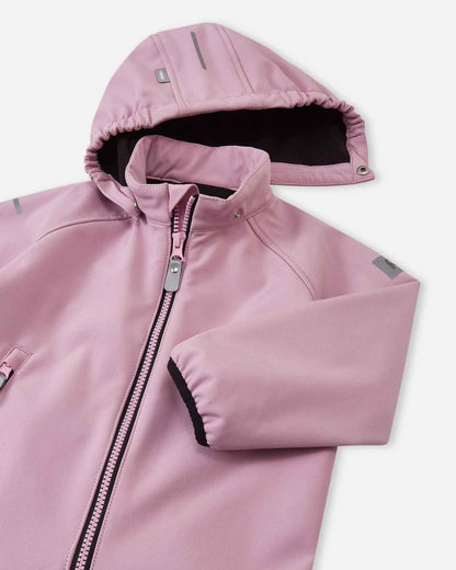 Close-up of the hood and high collar on the grey pink Reima Mjosa kids' softshell suit, highlighting the cozy fleece lining and safe, detachable hood mechanism.