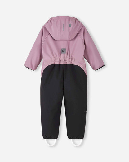 Back view of the grey pink Reima Mjosa kids' softshell overall, showcasing an elastic waist for a comfortable fit, reinforced black seat panels, and a reflective safety patch.