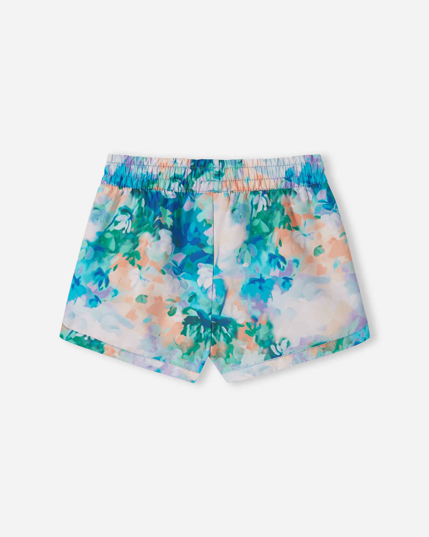 Back view of the fresh blue Reima Nauru girls' UPF 50+ beach shorts, showcasing the continuous watercolor floral pattern, gathered elastic waistband, and quick-drying sunproof fabric.