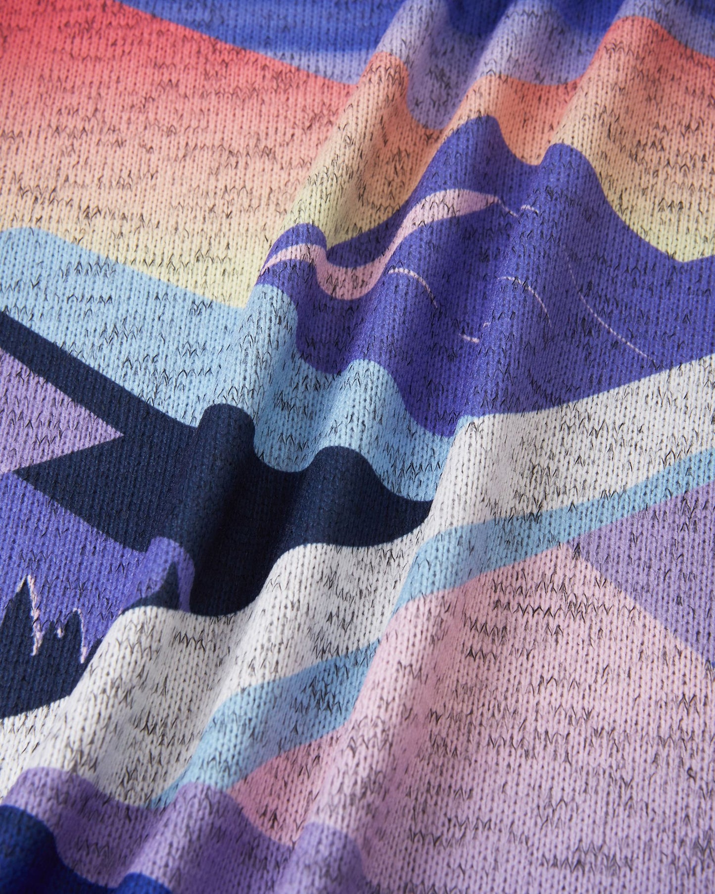 Macro close-up texture view of the breezy violet Reima Niksini kids' fleece knit fabric, highlighting the breathable, moisture-wicking thermal material designed for cold-weather layering.