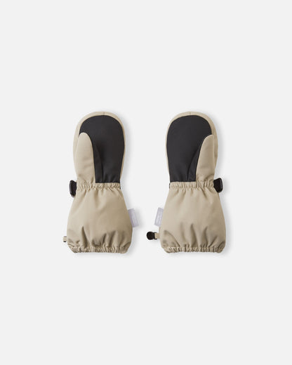 Palm view of the Reima Ote kids' winter mittens in earthy beige, detailing the highly durable black reinforced palm and thumb designed for gripping sleds and playing in harsh winter conditions.