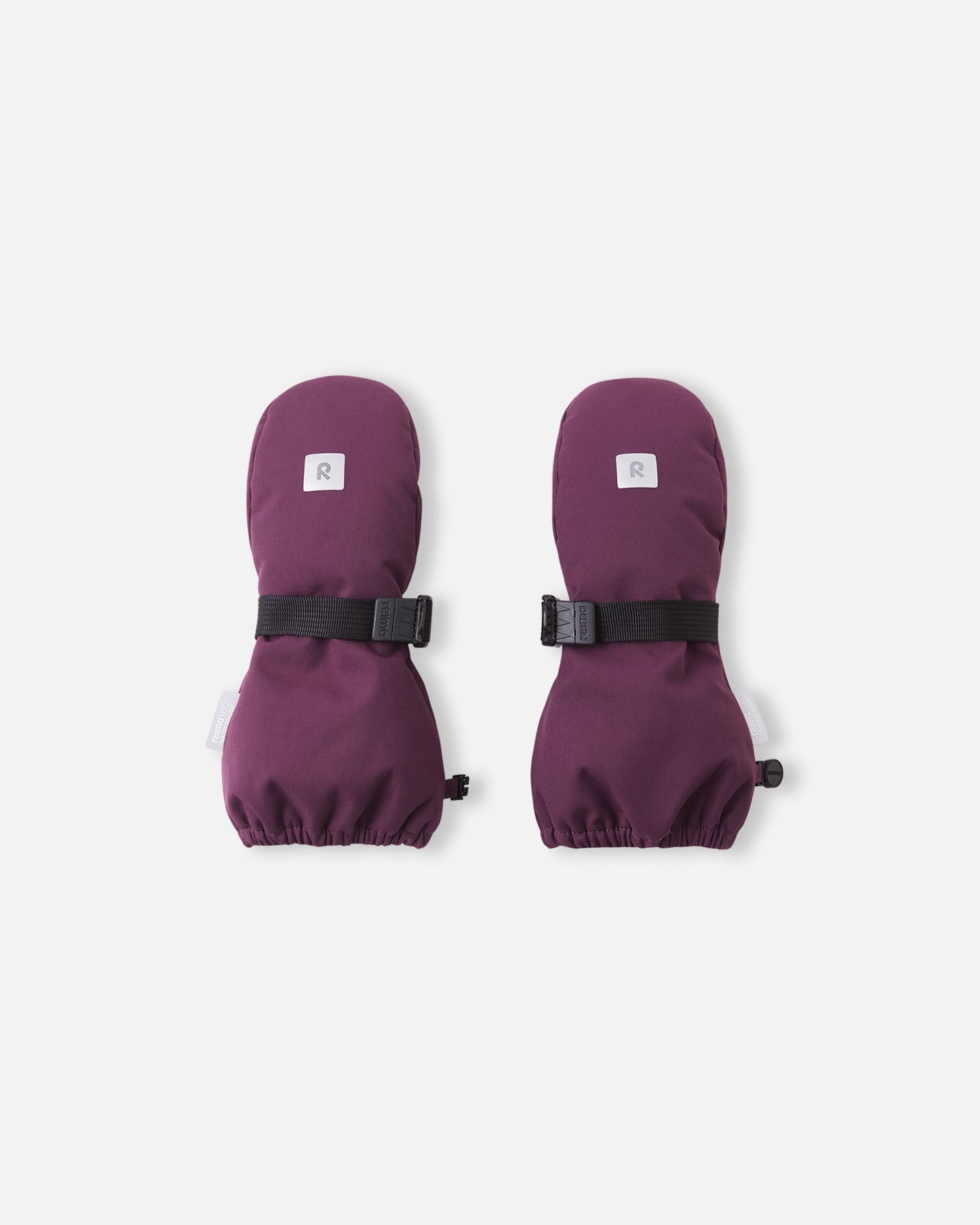 Front top view of the deep purple Reima Ote kids' winter mittens, featuring a highly visible reflective safety logo, a durable waterproof exterior, and a secure adjustable velcro wrist strap to keep snow out.