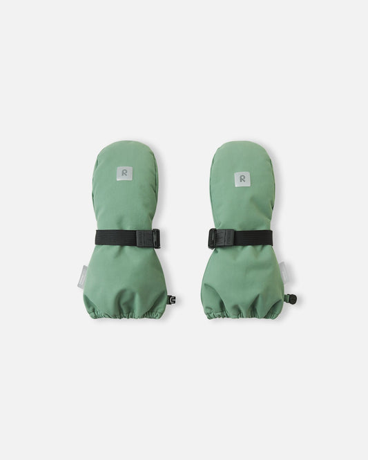 Top view of the highly durable Reima Ote kids' winter mittens in green clay, showcasing an adjustable velcro wrist strap for a secure fit and a reflective Reima logo patch for winter visibility.