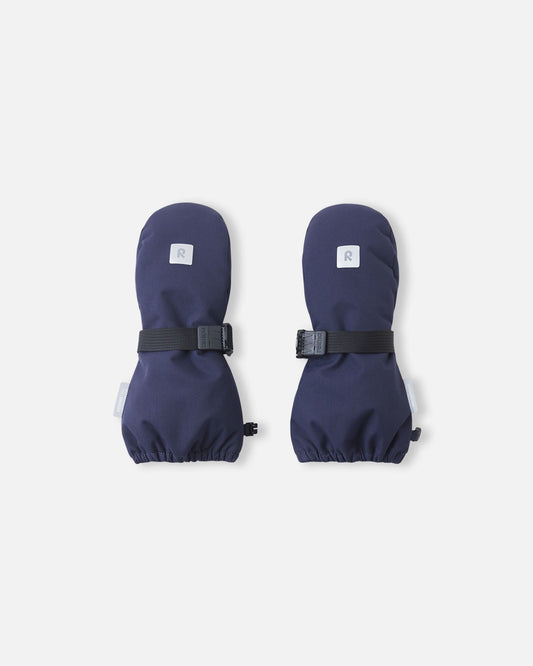 Front top view of the navy blue Reima Ote kids' winter mittens, featuring a highly visible reflective safety logo, a durable waterproof exterior, and a secure adjustable wrist strap to keep snow out.