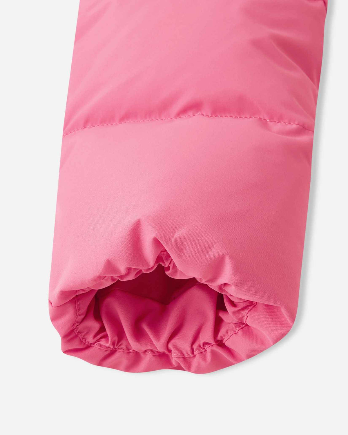 Detail shot of the sleeve opening on the soft coral Reima Paimio kids' warm jacket, showcasing the gathered stretch elastic cuff designed to trap body heat and block cold air.
